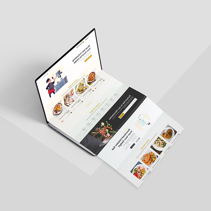 Landing page design mockup shown across a laptop and folded page layout